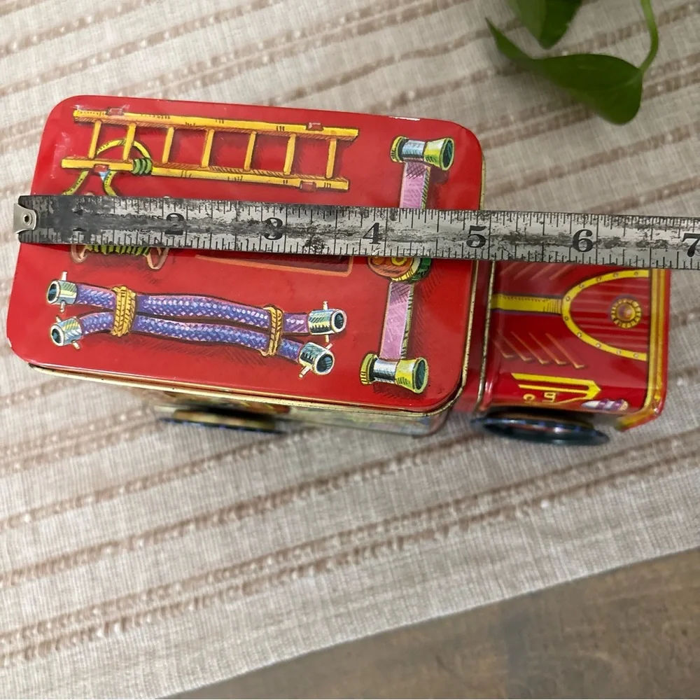 Vintage Fire Truck Bank- from part comes Off main- Actually rolls around.